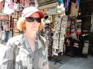 dorky tourist wearing a baseball cap