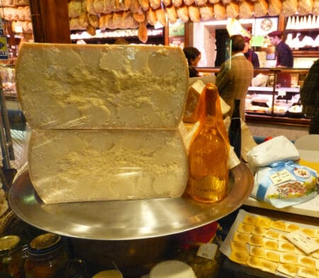 large wedges of Cheese on display in Parma, Italy