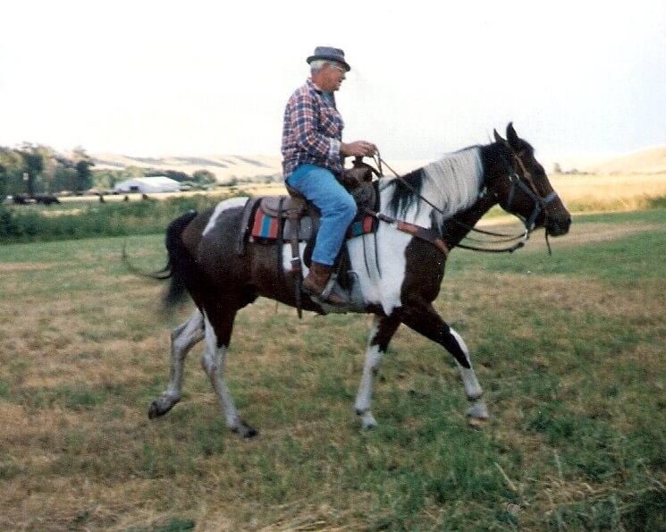 sixty year old man horseback riding