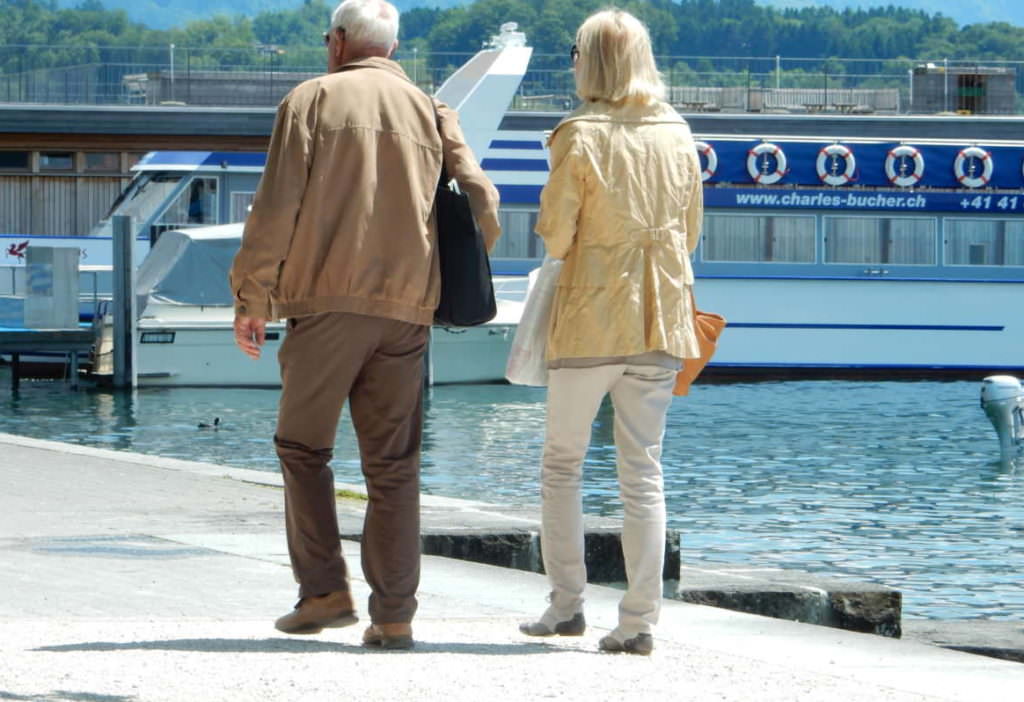 Shadows of a couple walking in sync - Lucerne, Switzerland
