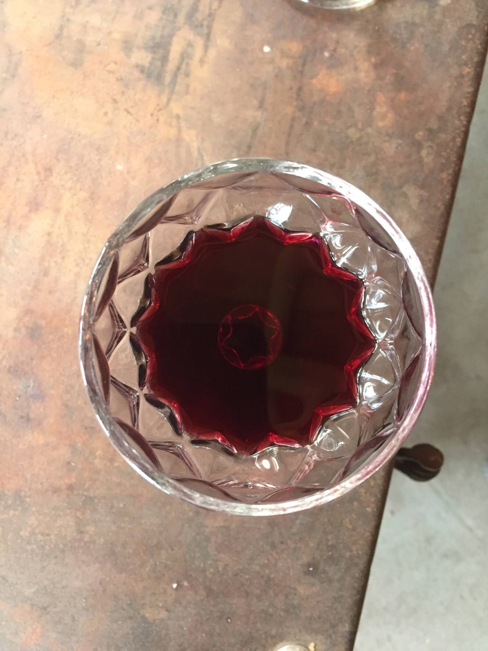 Red wine in crystal glass looking down from above